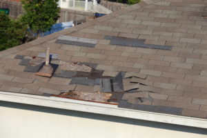 wind damage to roof shingles repair shingle restoration contractor